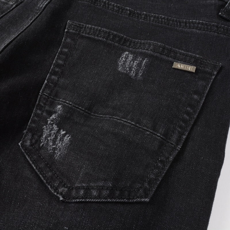 AMIRI Jeans #875 – Slim Fit Distressed Denim