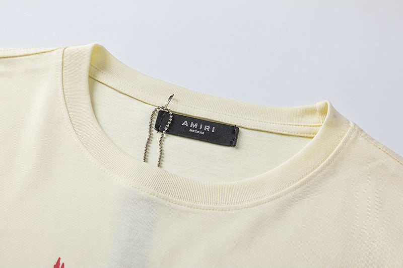 AMIRI Graphic-Print Cotton T-Shirt | Black, White & Apricot