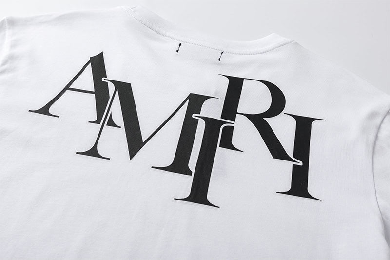 AMIRI Staggered Logo T-Shirt | White & Black