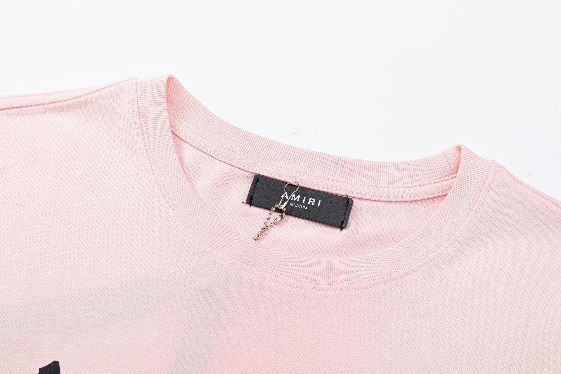 AMIRI Logo-Appliquéd Distressed Cotton Jersey T-Shirt | Pink