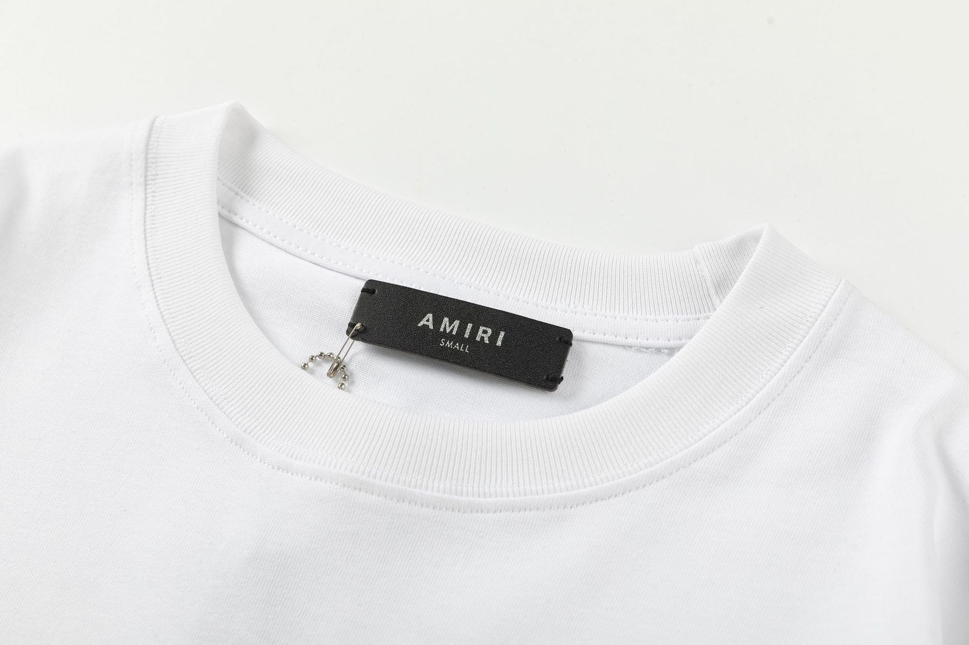 AMIRI Cherub Logo-Print T-Shirt | White & Black