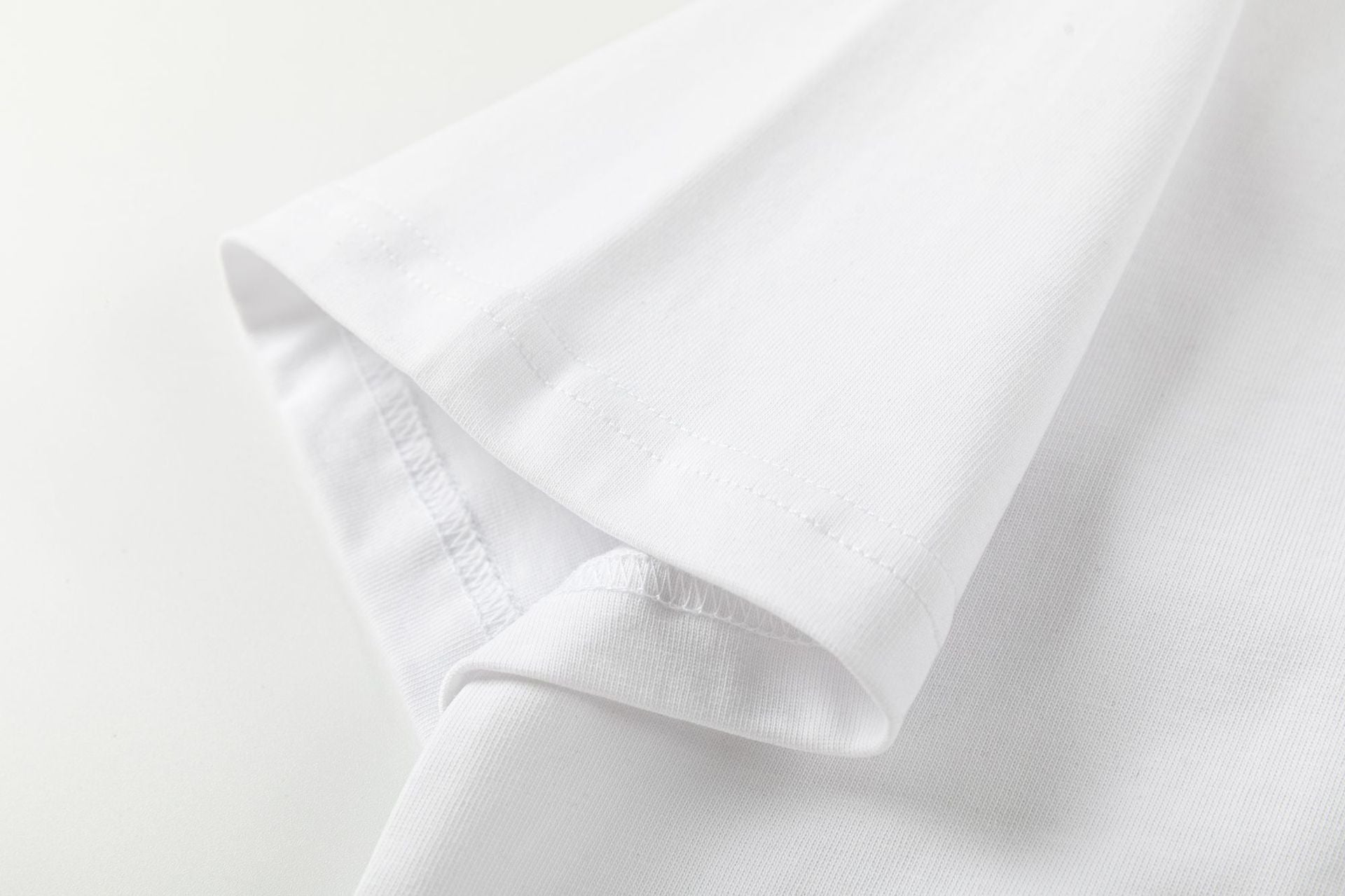 AMIRI Cherub Logo-Print T-Shirt | White & Black