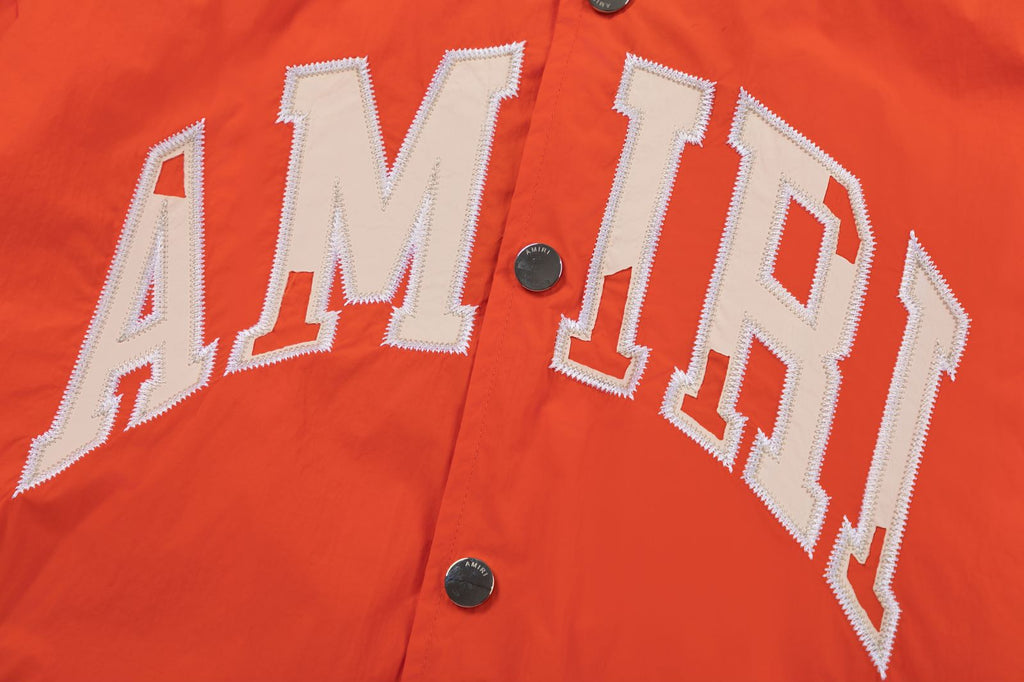AMIRI Logo-Appliquéd Padded Shell Bomber Jacket – Orange & Black