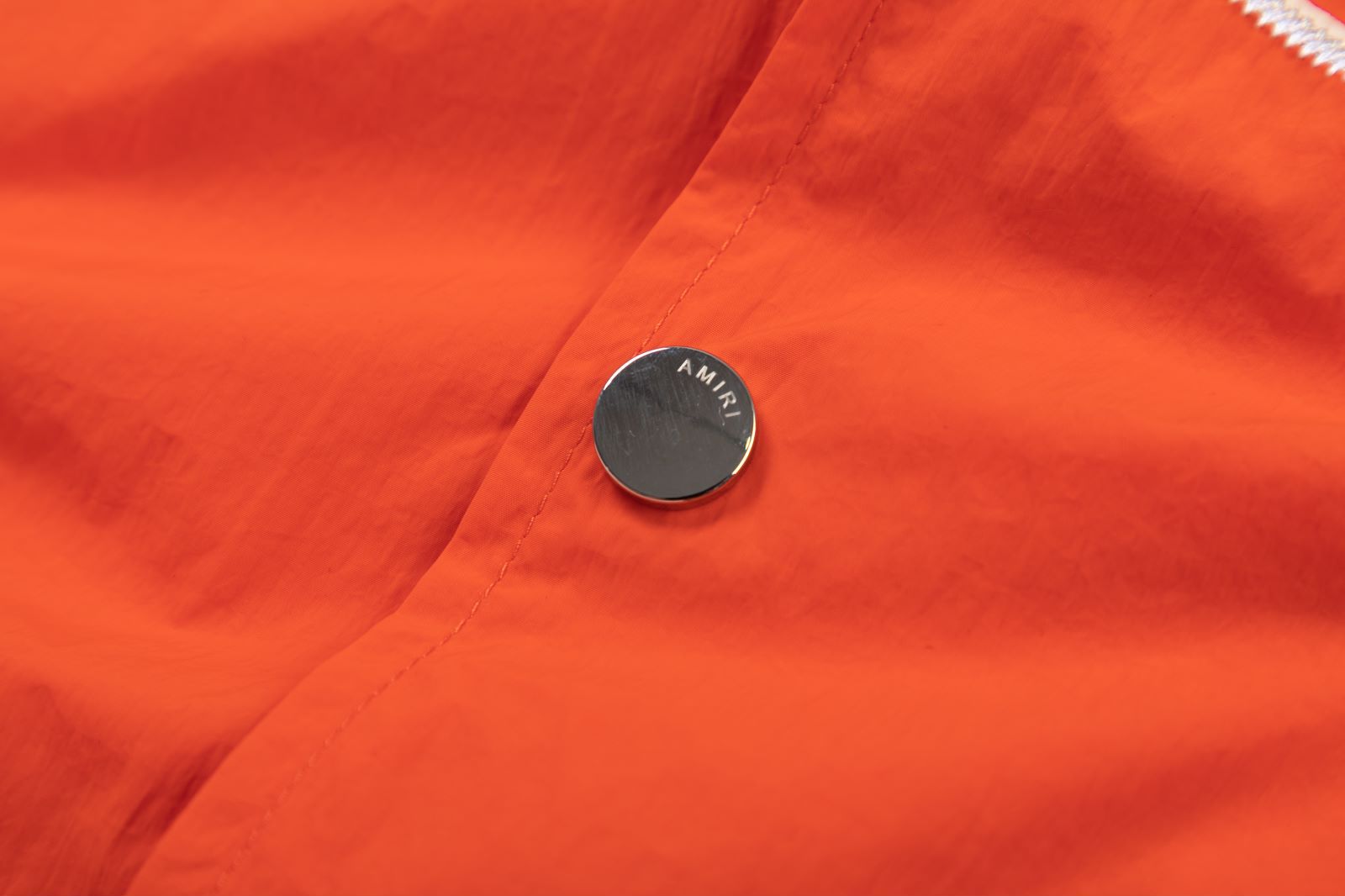 AMIRI Logo-Appliquéd Padded Shell Bomber Jacket – Orange & Black