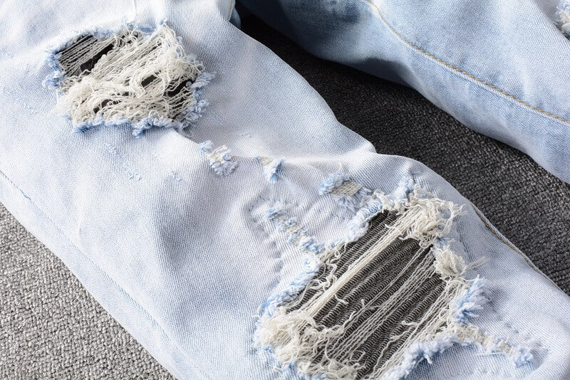AMIRI Jeans #699 – Slim Fit Distressed Denim