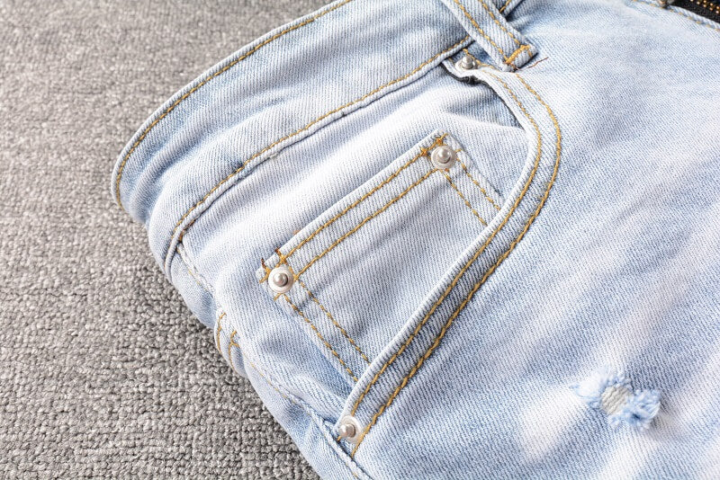 AMIRI Jeans #699 – Slim Fit Distressed Denim