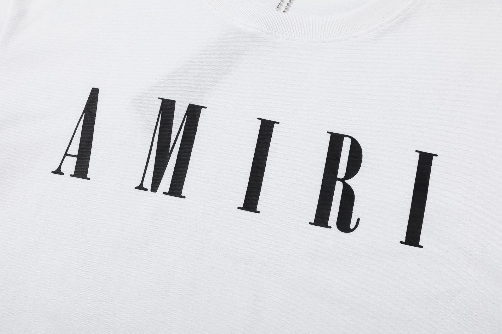 AMIRI Logo-Print Cotton Jersey T-Shirt | Black, White & Black Blue