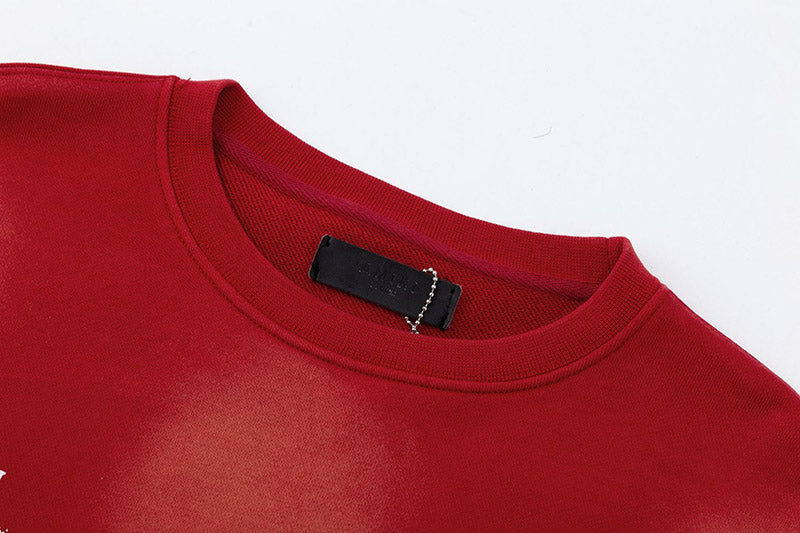 AMIRI Logo-Print Distressed Cotton Jersey Sweatshirt