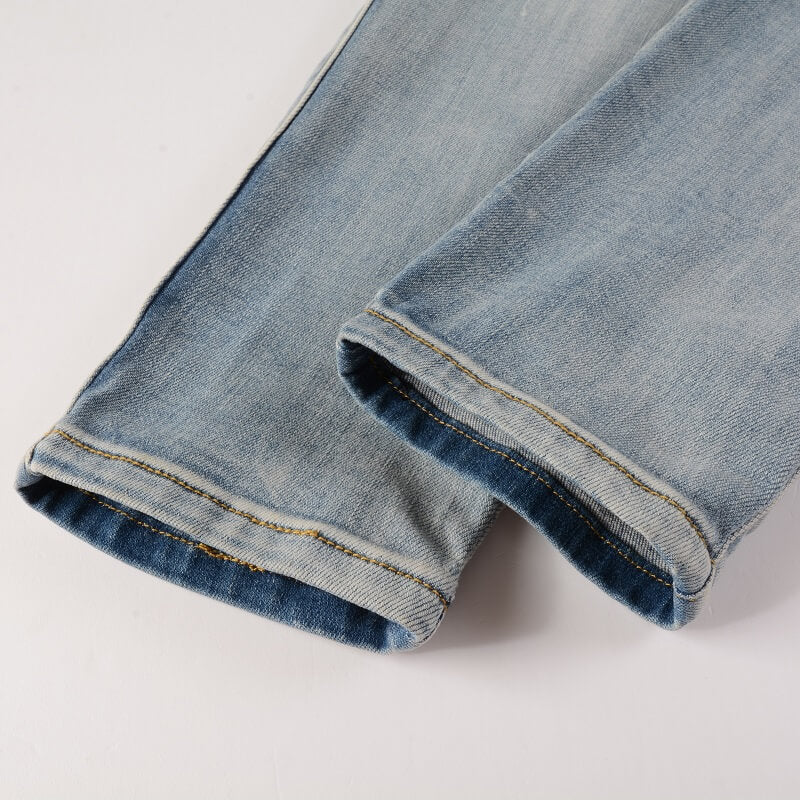 AMIRI Jeans #606 – Slim Fit Distressed Denim