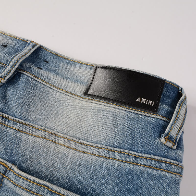 AMIRI Jeans #606 – Slim Fit Distressed Denim
