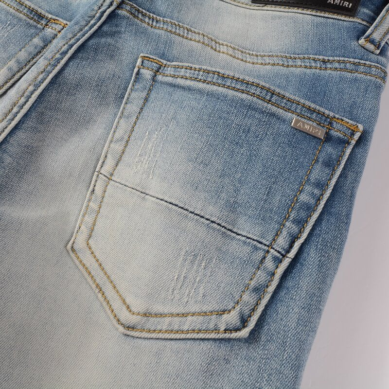 AMIRI Jeans #606 – Slim Fit Distressed Denim
