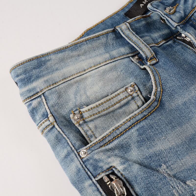 AMIRI Jeans #606 – Slim Fit Distressed Denim