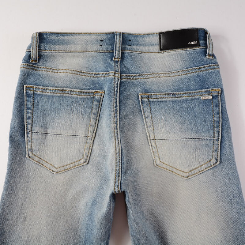 AMIRI Jeans #606 – Slim Fit Distressed Denim