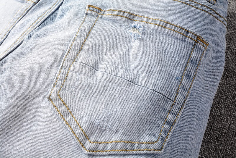 AMIRI Jeans #699 – Slim Fit Distressed Denim